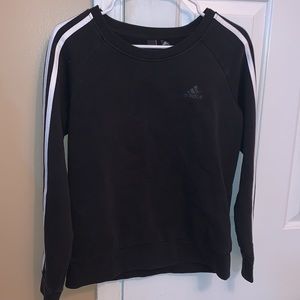 black adidas top with white stripes on the arms